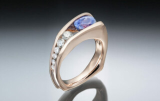 Purple Sapphire And Rose Gold Floating Ring
