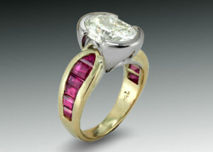 Oval Diamond And Ruby Bimetal Ring