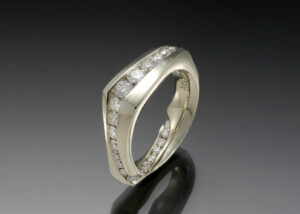 Twisting Channel Diamond Band