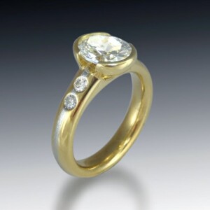 Half Bezel Oval Engagement Ring