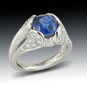 Blue Sapphire Diamond Encrusted Platinum Ring
