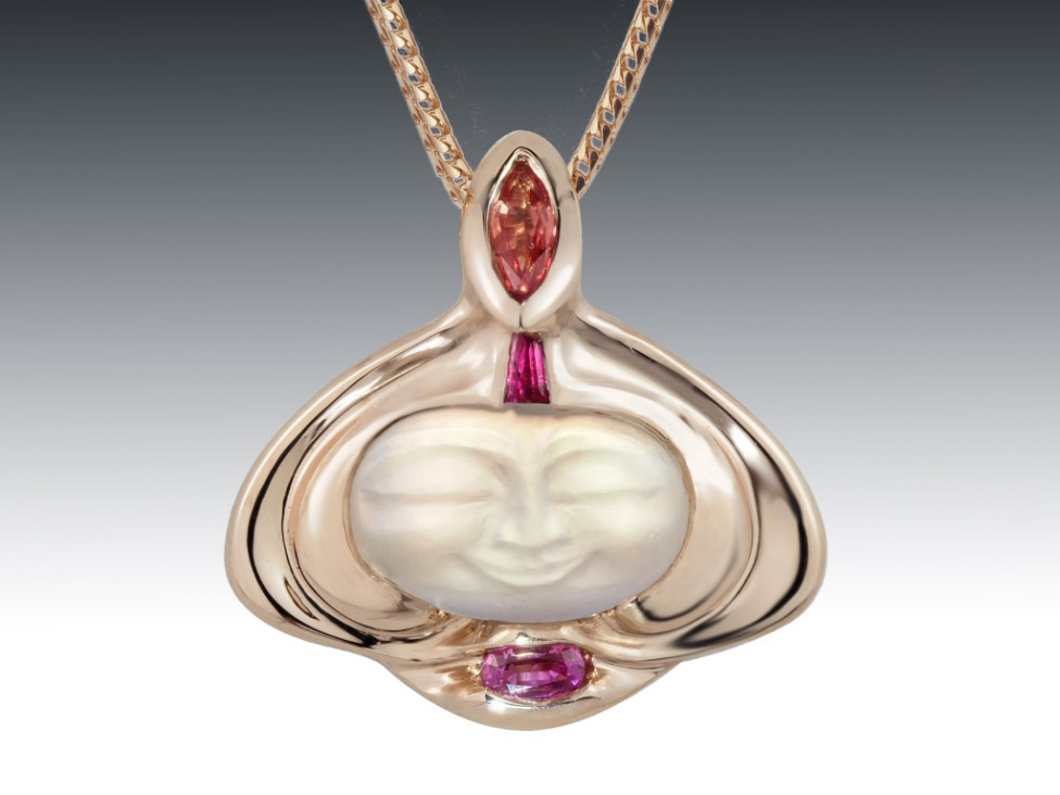 Carved Red Moonstone Pendant