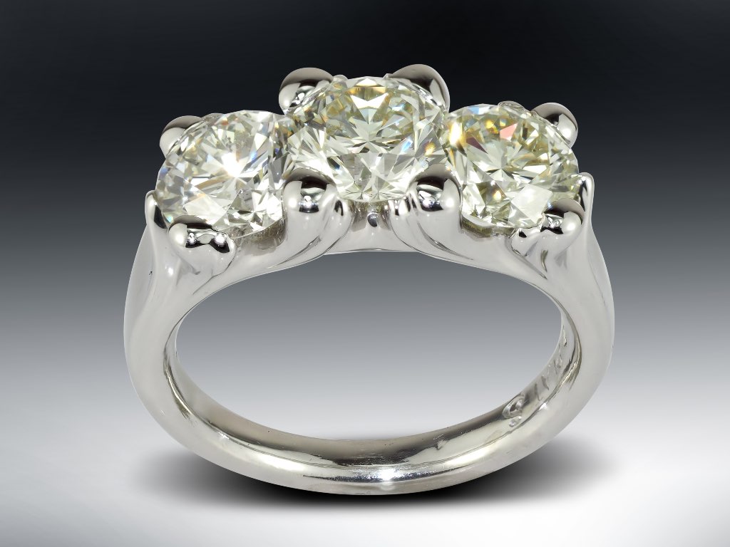 Three Stone Curved Prong Engagement Ring